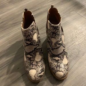 Women’s size 9 snake skin SODA booties.